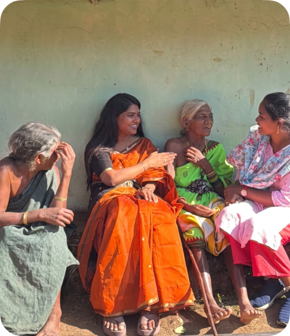 A volunteer with community members